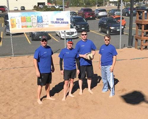 Saint Paul employees team up for volleyball